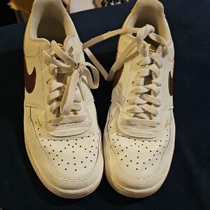 Nike White and Brown Sneakers with Yellow Accents
